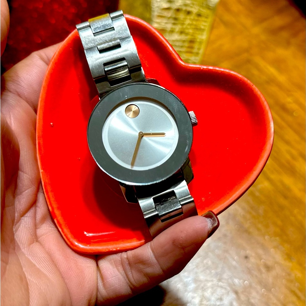 Movado Bold stainless & rose gold. Price is firm with very little wiggle room